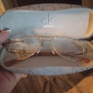 Calvin Klein Gold Aviator Glasses Unisex